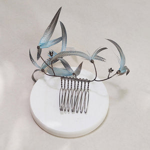 Cecilie Boccara/Light blue feather hair comb