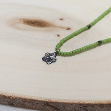 Load image into Gallery viewer, Cooperative de Creation/Green glass bead with silver flower necklace - OBEIOBEI