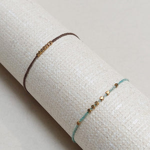 Cooperative de Creation/Small gold bead bracelet - OBEIOBEI